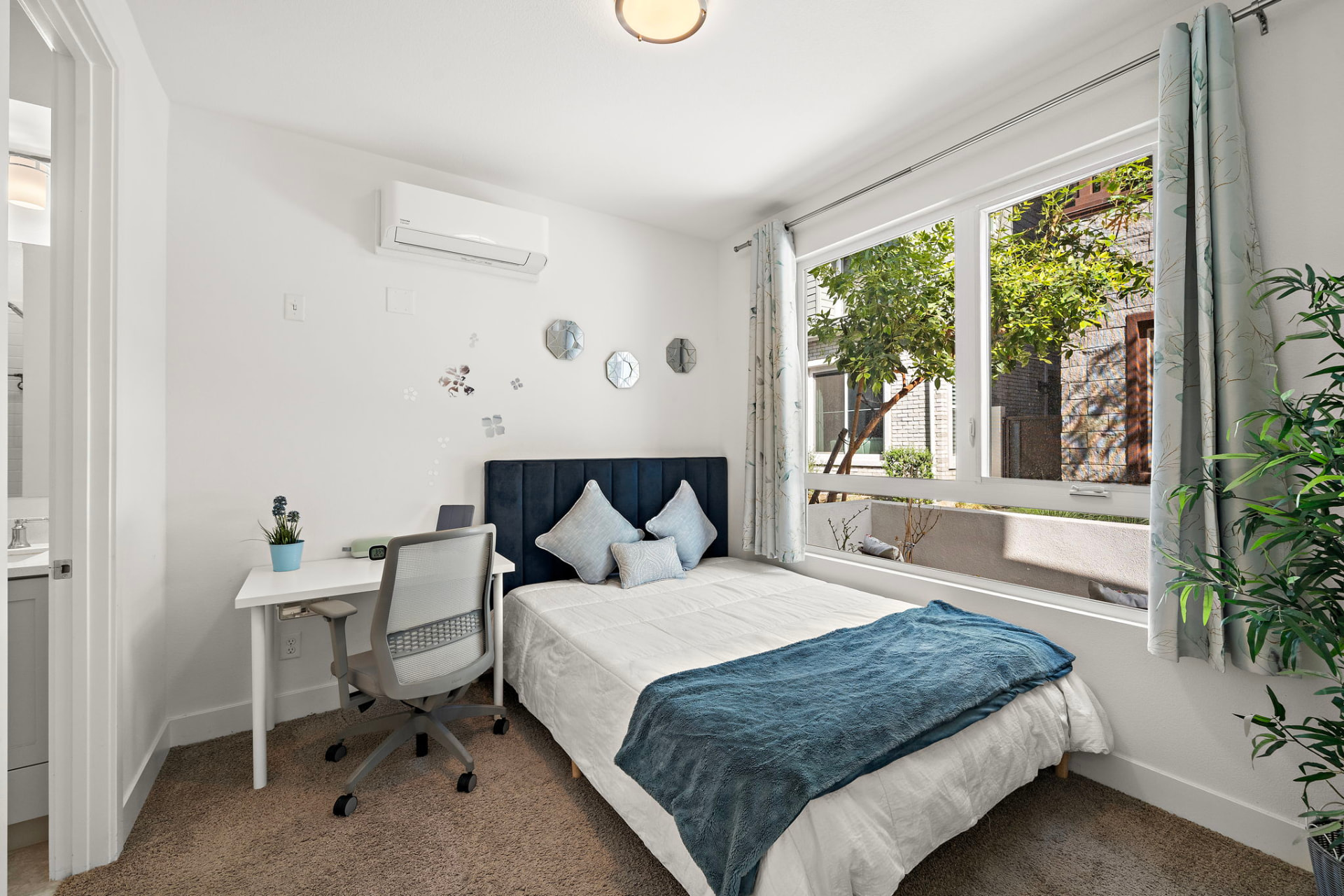 Main-level bedroom suite with ensuite bath access at 230 Abacus in Irvine