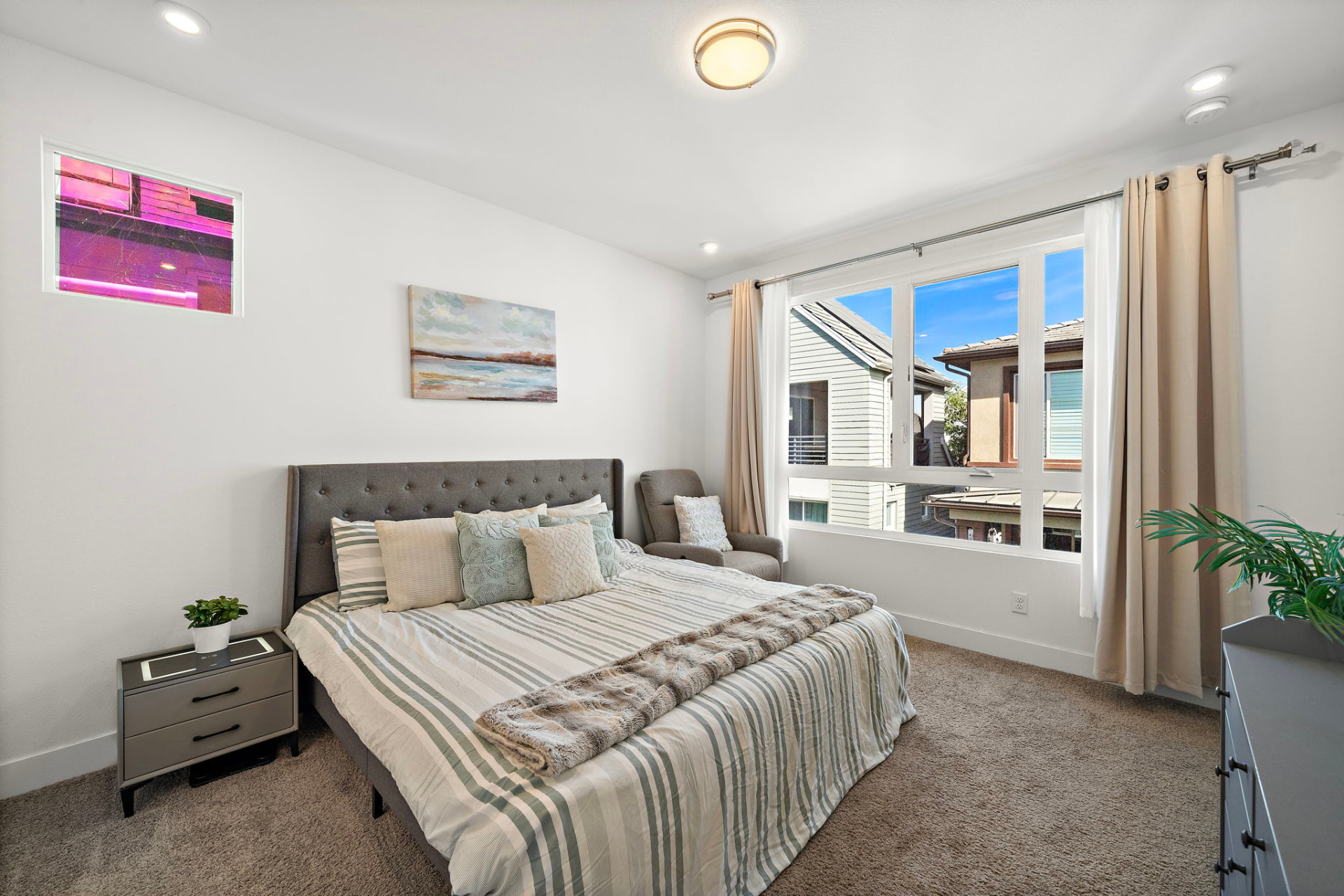 Primary bedroom with large window at 230 Abacus in Irvine