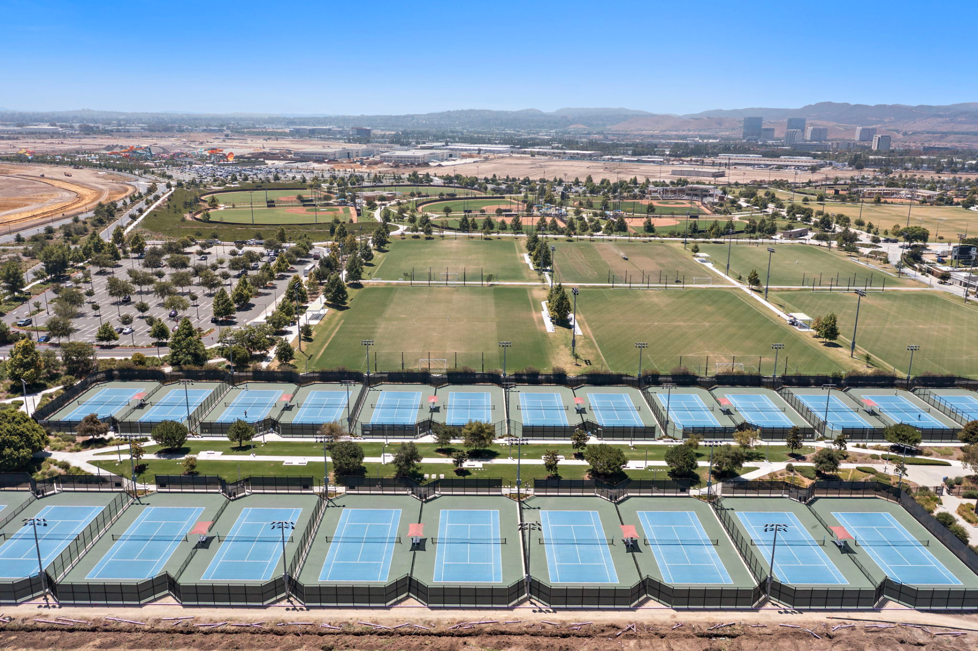 Aerial view of Great Park sports fields and tennis courts near 230 Abacus in Irvine
