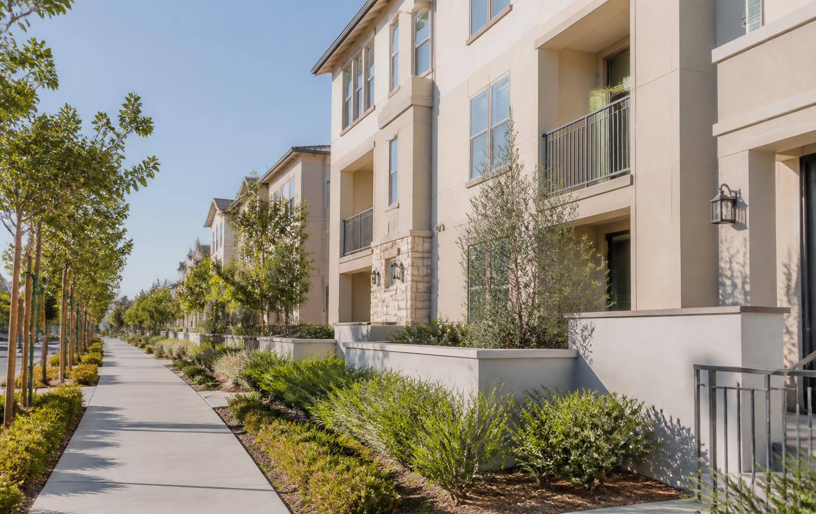 Master-planned Orange County neighborhood with modern homes, wide sidewalk and manicured landscaping